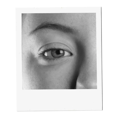 A close-up, black and white photograph captures the intricate details of a human eye. The iris, a mesmerizing mix of light and dark tones, surrounds a dark pupil, reflecting subtle highlights. Delicate eyelashes frame the lower eyelid, while the upper lid is partially visible, casting a soft shadow. Above the eye, a well-defined eyebrow adds structure to the face. The surrounding skin shows fine texture and subtle shading, emphasizing the eye as the focal point. A close-up, black and white photograph captures the intricate details of a human eye. The iris, a mesmerizing mix of light and dark tones, surrounds a dark pupil, reflecting subtle highlights. Delicate eyelashes frame the lower eyelid, while the upper lid is partially visible, casting a soft shadow. Above the eye, a well-defined eyebrow adds structure to the face. The surrounding skin shows fine texture and subtle shading, emphasizing the eye as the focal point.