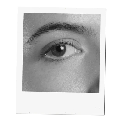 A close-up, black and white photograph captures the intricate details of a human eye. The iris, a mesmerizing mix of light and dark tones, surrounds a dark pupil, reflecting subtle highlights. Delicate eyelashes frame the lower eyelid, while the upper lid is partially visible, casting a soft shadow. Above the eye, a well-defined eyebrow adds structure to the face. The surrounding skin shows fine texture and subtle shading, emphasizing the eye as the focal point. A close-up, black and white photograph captures the intricate details of a human eye. The iris, a mesmerizing mix of light and dark tones, surrounds a dark pupil, reflecting subtle highlights. Delicate eyelashes frame the lower eyelid, while the upper lid is partially visible, casting a soft shadow. Above the eye, a well-defined eyebrow adds structure to the face. The surrounding skin shows fine texture and subtle shading, emphasizing the eye as the focal point.
