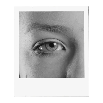 A close-up, black and white photograph captures the intricate details of a human eye. The iris, a mesmerizing mix of light and dark tones, surrounds a dark pupil, reflecting subtle highlights. Delicate eyelashes frame the lower eyelid, while the upper lid is partially visible, casting a soft shadow. Above the eye, a well-defined eyebrow adds structure to the face. The surrounding skin shows fine texture and subtle shading, emphasizing the eye as the focal point. A close-up, black and white photograph captures the intricate details of a human eye. The iris, a mesmerizing mix of light and dark tones, surrounds a dark pupil, reflecting subtle highlights. Delicate eyelashes frame the lower eyelid, while the upper lid is partially visible, casting a soft shadow. Above the eye, a well-defined eyebrow adds structure to the face. The surrounding skin shows fine texture and subtle shading, emphasizing the eye as the focal point.