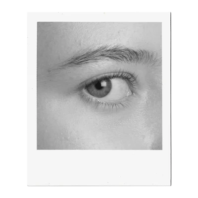 A close-up, black and white photograph captures the intricate details of a human eye. The iris, a mesmerizing mix of light and dark tones, surrounds a dark pupil, reflecting subtle highlights. Delicate eyelashes frame the lower eyelid, while the upper lid is partially visible, casting a soft shadow. Above the eye, a well-defined eyebrow adds structure to the face. The surrounding skin shows fine texture and subtle shading, emphasizing the eye as the focal point. A close-up, black and white photograph captures the intricate details of a human eye. The iris, a mesmerizing mix of light and dark tones, surrounds a dark pupil, reflecting subtle highlights. Delicate eyelashes frame the lower eyelid, while the upper lid is partially visible, casting a soft shadow. Above the eye, a well-defined eyebrow adds structure to the face. The surrounding skin shows fine texture and subtle shading, emphasizing the eye as the focal point.